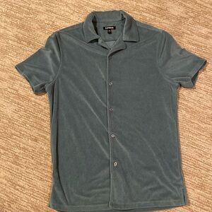 Teal button-down terry shirt, size small men’s
Slim fit.  Cotton/Polyester